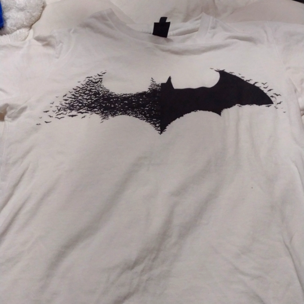 A white tshirt with batman logo